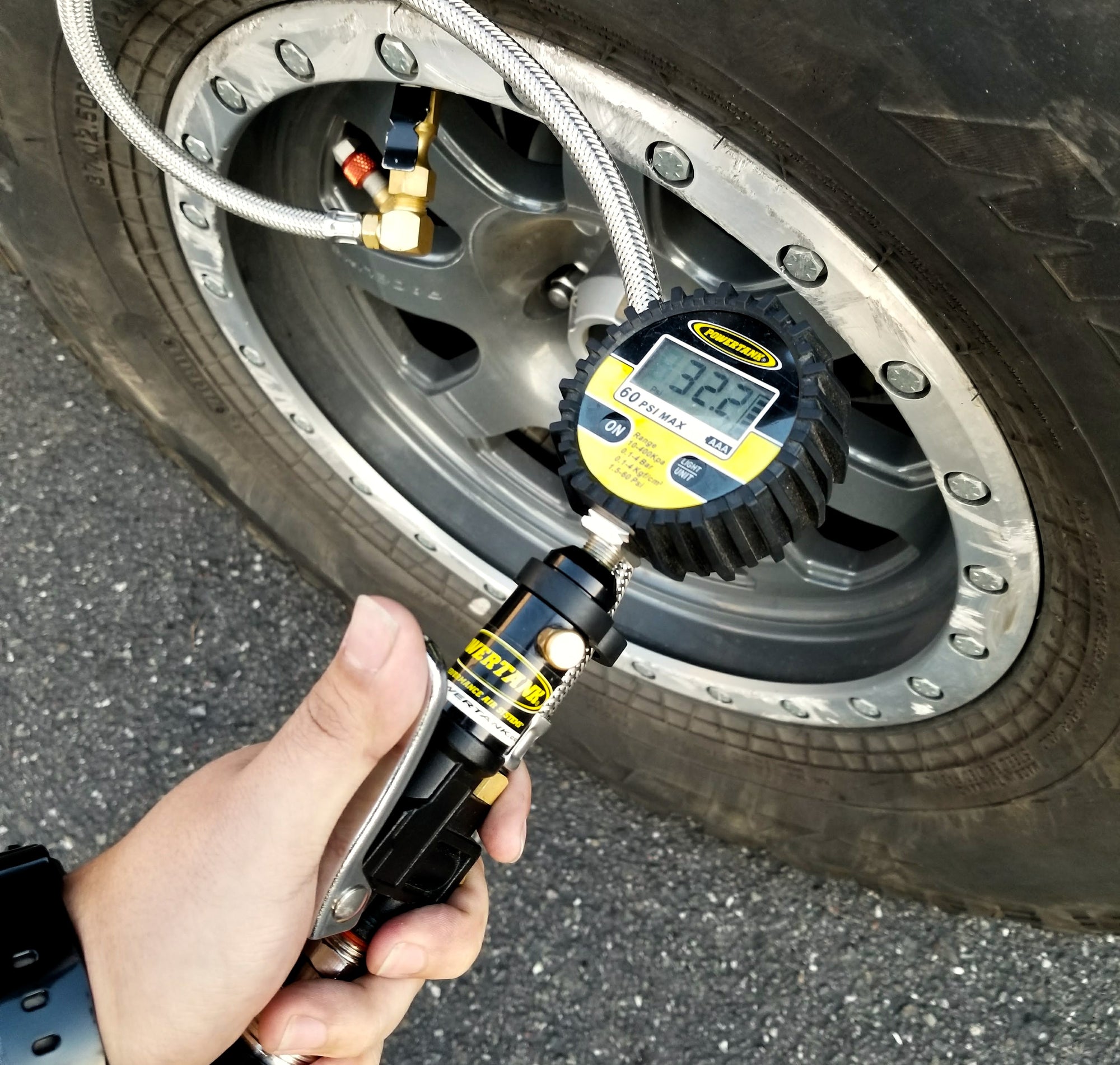 tire inflator with digital gauge airing up jeep tire 